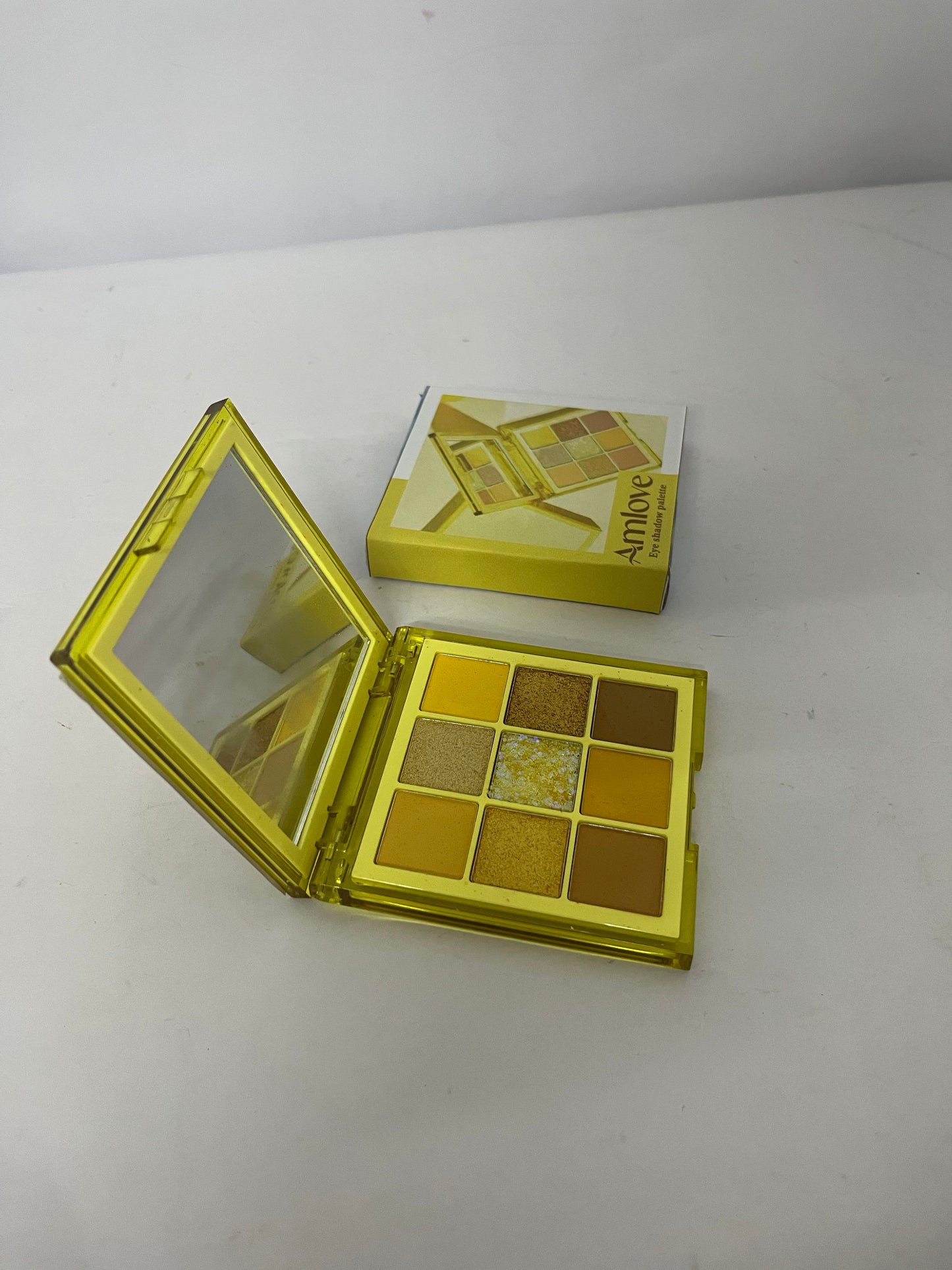 Amlove 9-Color Eyeshadow Palette, Transparent Yellow Case with Matte Shimmer Pearl Textures, Versatile for Daily & Party Looks