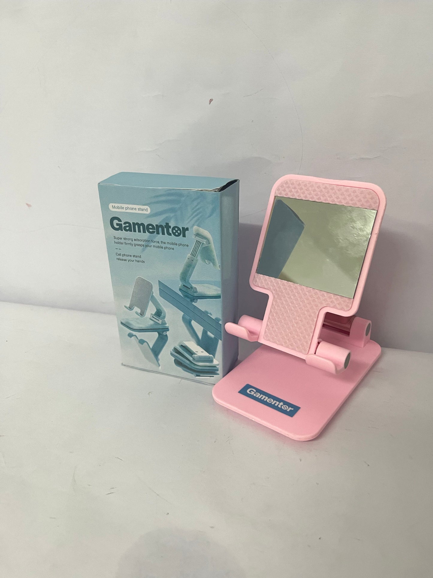 Gamentor Cell Phone Stand, Adjustable Angle and Height Cell Phone Holder for Desk, Foldable and Portable, Anti-Slip Silicone Pad, Compatible with All Mobile Phones and 4-8 Inch Devices, Pink