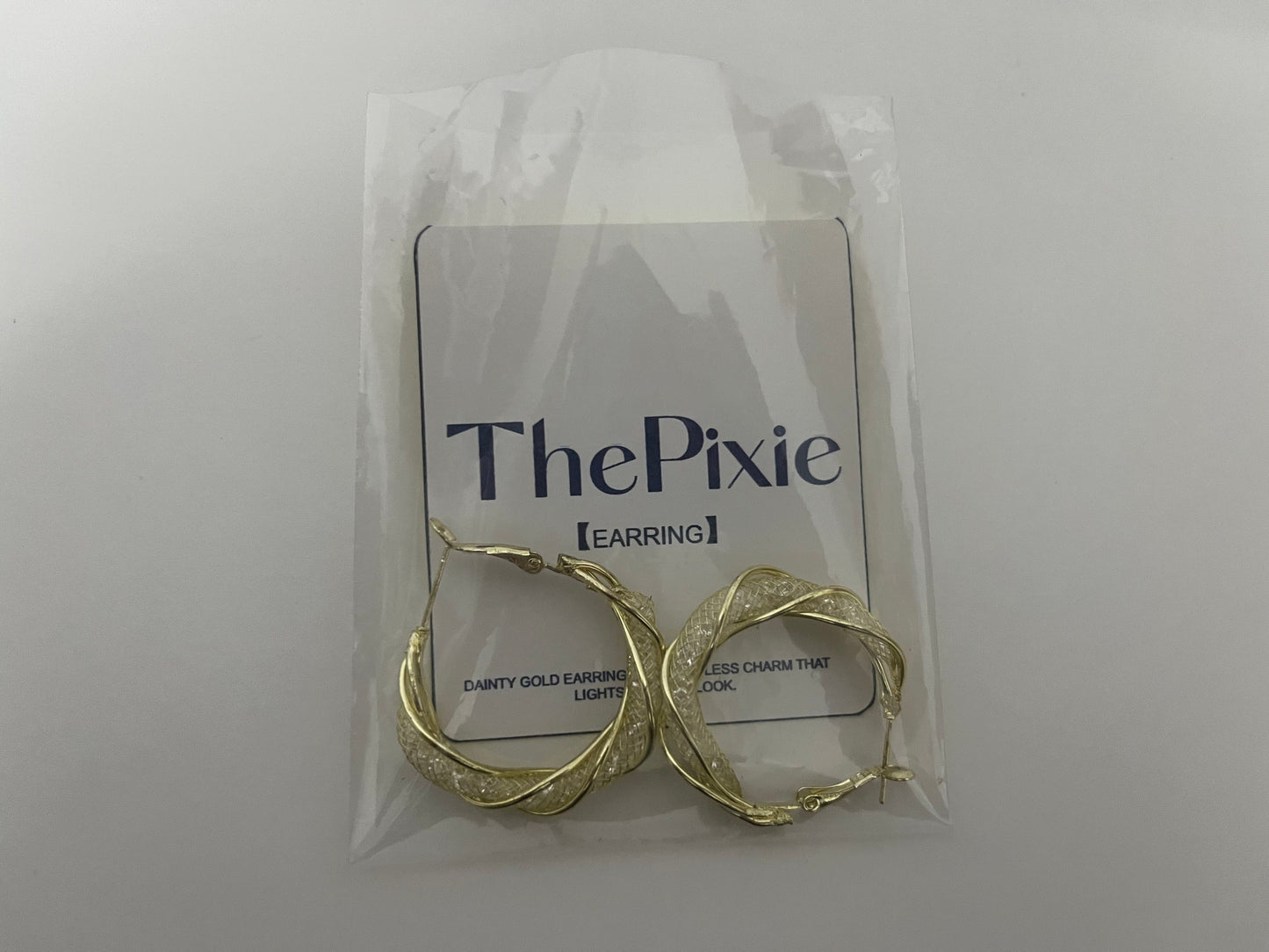 ThePixie Braided Gold Hoop Earrings An Elegant & Shiny Styling Essential