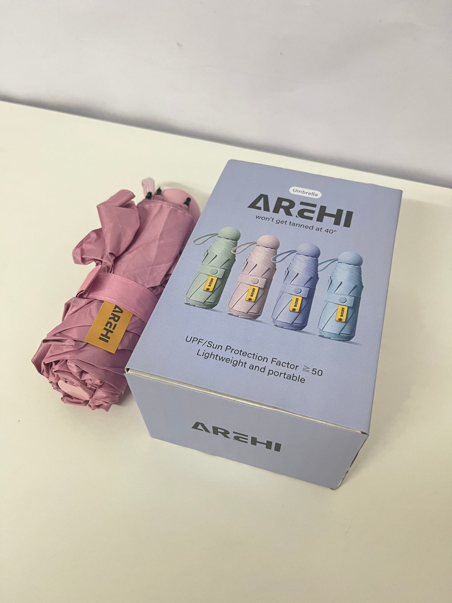 AREHI Mini Capsule Sun Protection Umbrella | UPF50+ Ultra-Light Portable Umbrella for Sun and Rain
