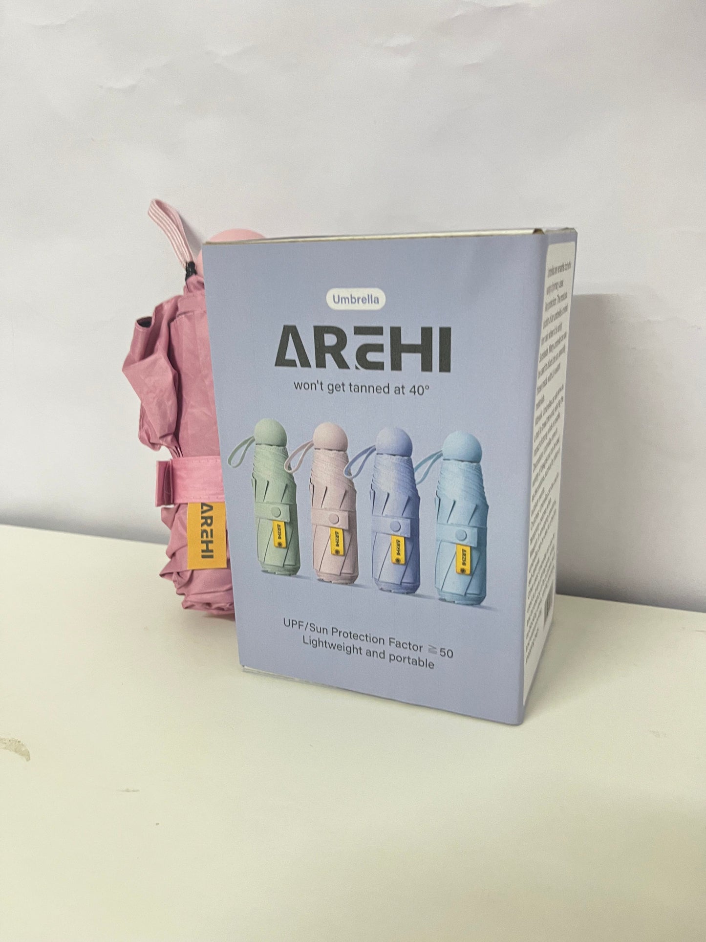 AREHI Mini Capsule Sun Protection Umbrella | UPF50+ Ultra-Light Portable Umbrella for Sun and Rain
