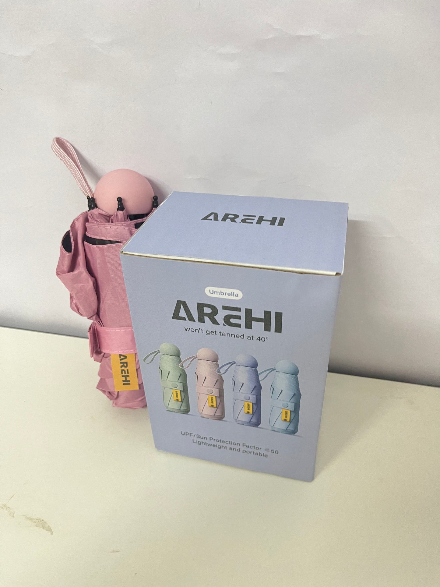 AREHI Mini Capsule Sun Protection Umbrella | UPF50+ Ultra-Light Portable Umbrella for Sun and Rain