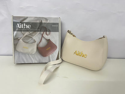 Aithe Ladies' Handbag - Beige with Gold Branding for Fashion-Forward Elegance