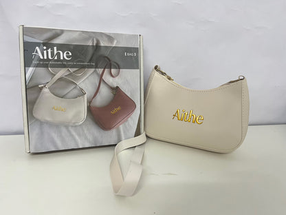 Aithe Ladies' Handbag - Beige with Gold Branding for Fashion-Forward Elegance