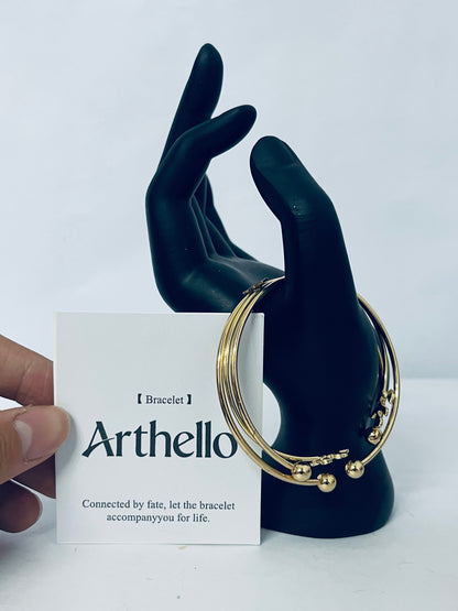 Arthello Layered Bangle Bracelet for Women Multi Layer Wire Cuff Bracelet Gold Stretch Stackable Bracelet Adjustable Statement Jeweley