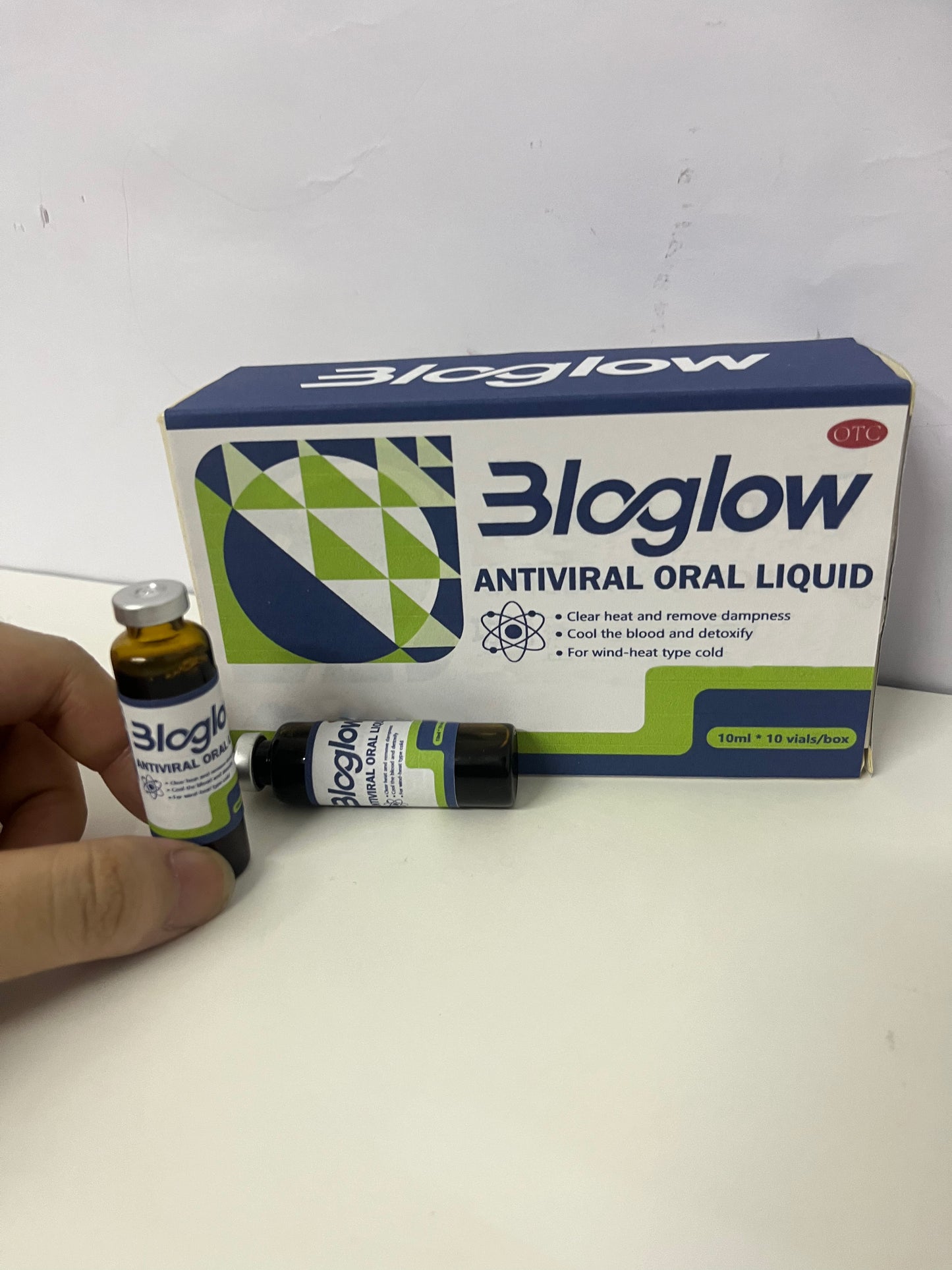 [Bloglow Pharmaceutical preparations, namely, antivirals]-Antiviral Oral Liquid - OTC Medication for Wind-Heat Type Cold