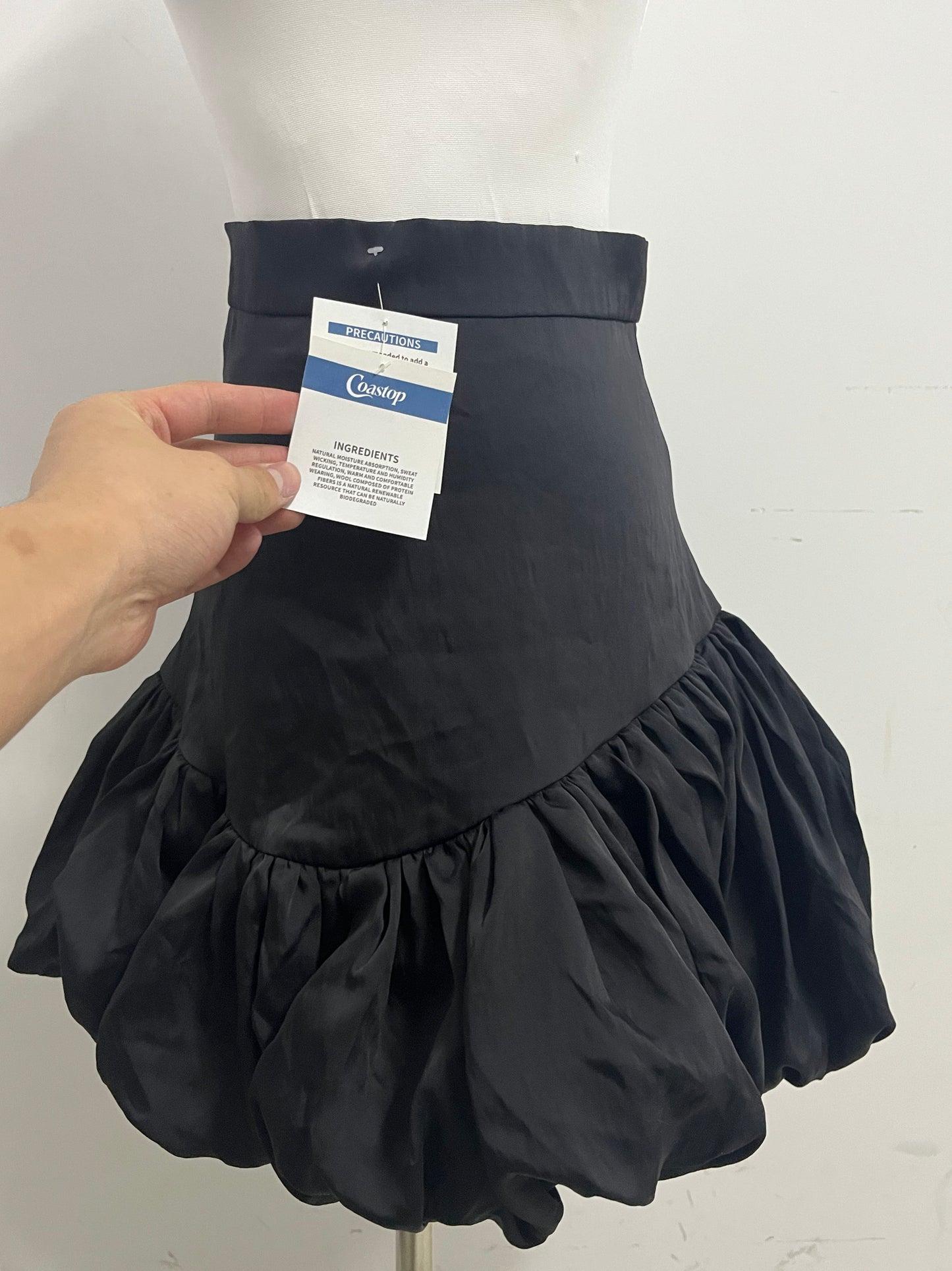 【Coastop Black Ruffled Puff Skirt】—— Stylish & Playful Wardrobe Essential