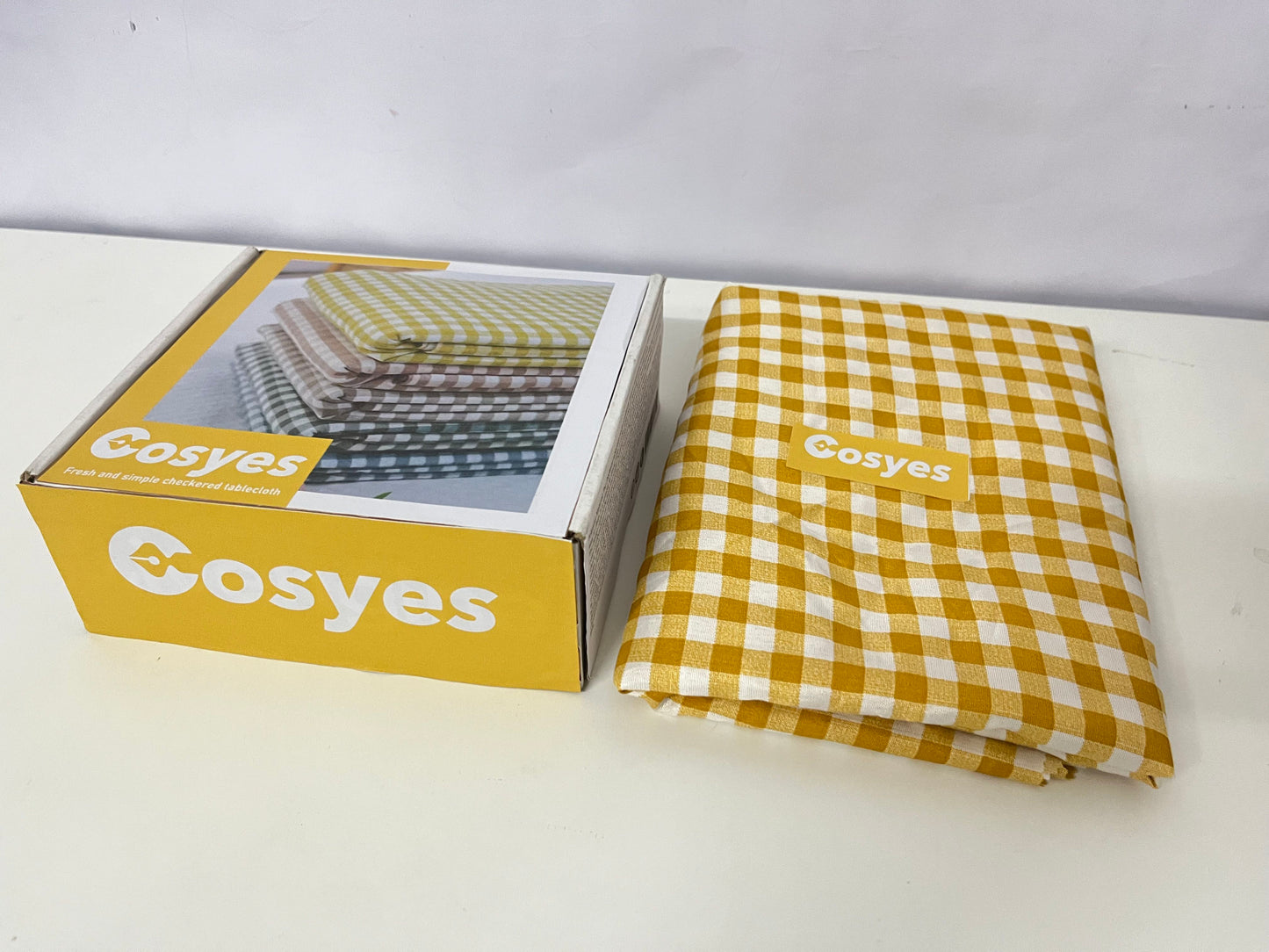 Cosyes Textile tablecloths , 54 x 108 Inch Tablecloth, Rectangle White and Yellow Checkered Table Covers for Picnic, Birthday, Party