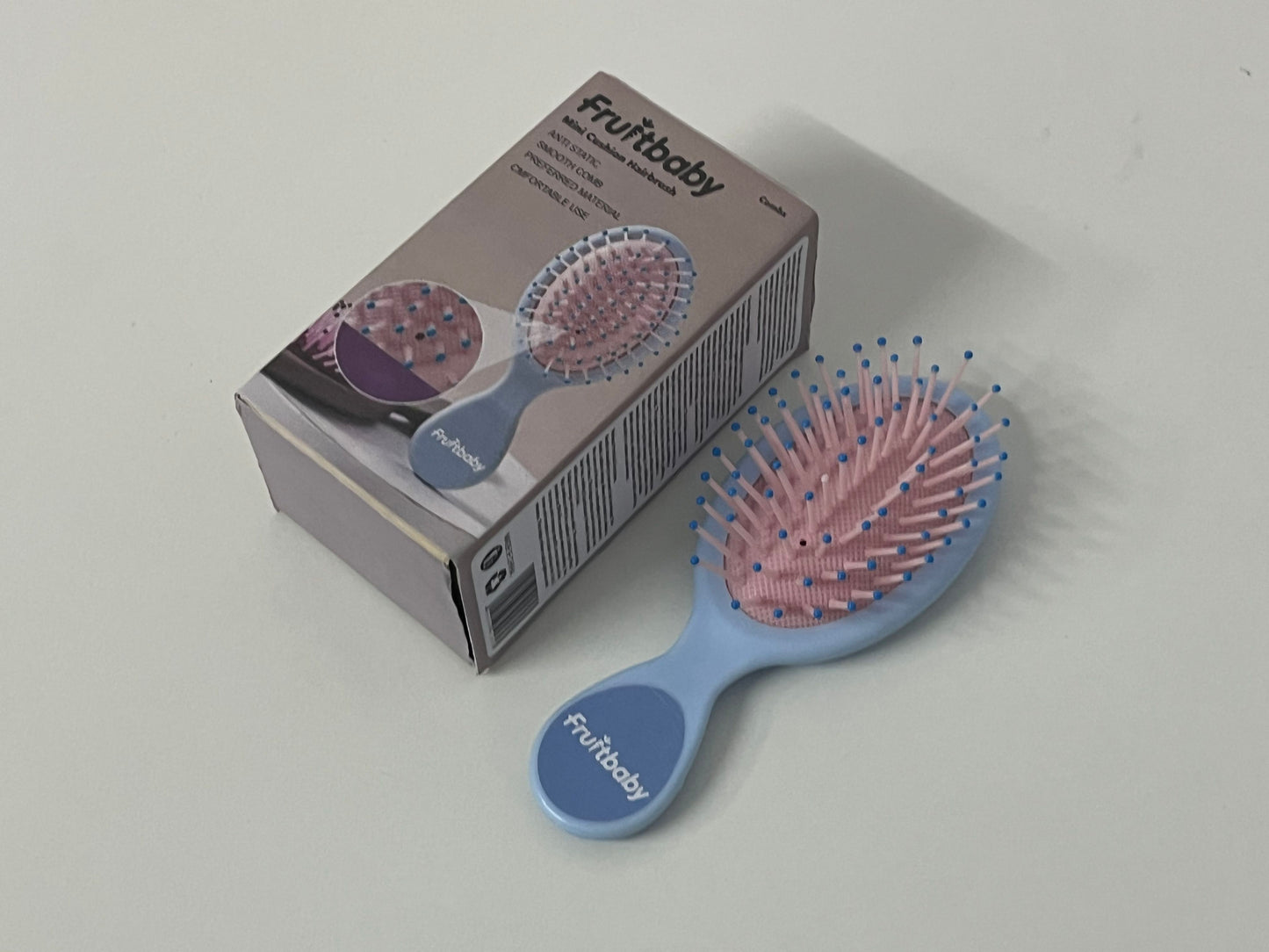 Fruitbaby Mini Cushion Hairbrush A Portable Hair Care Essential for Smooth & Gentle Brushing