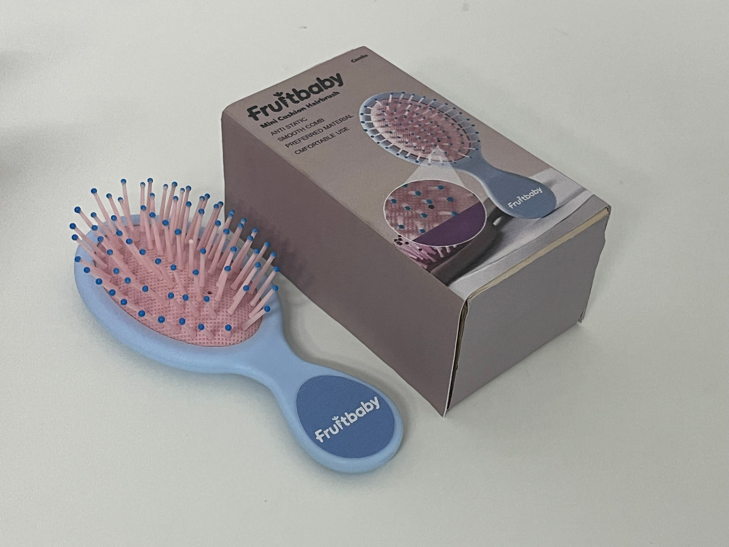 Fruitbaby Mini Cushion Hairbrush A Portable Hair Care Essential for Smooth & Gentle Brushing