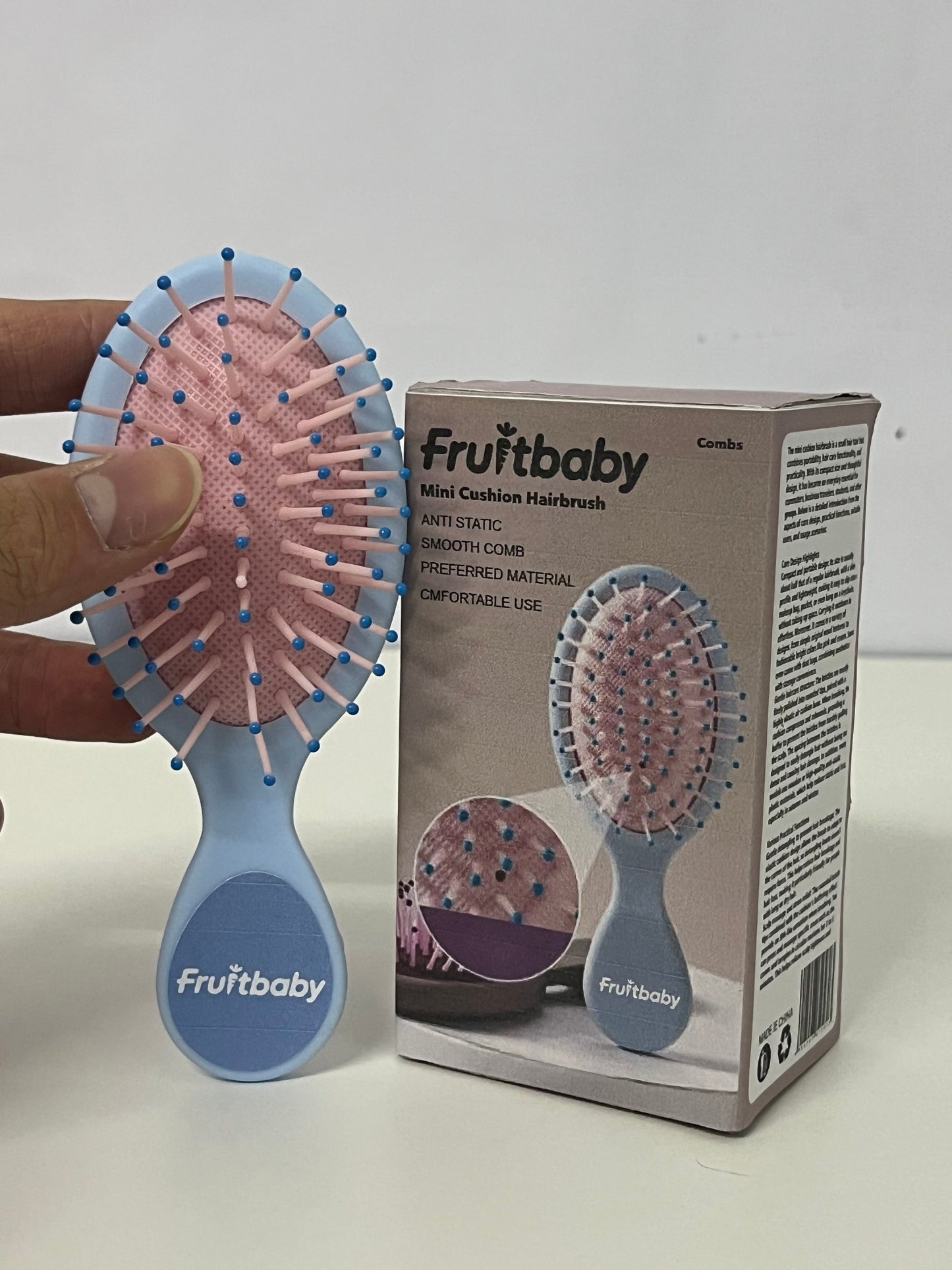 Fruitbaby Mini Cushion Hairbrush A Portable Hair Care Essential for Smooth & Gentle Brushing
