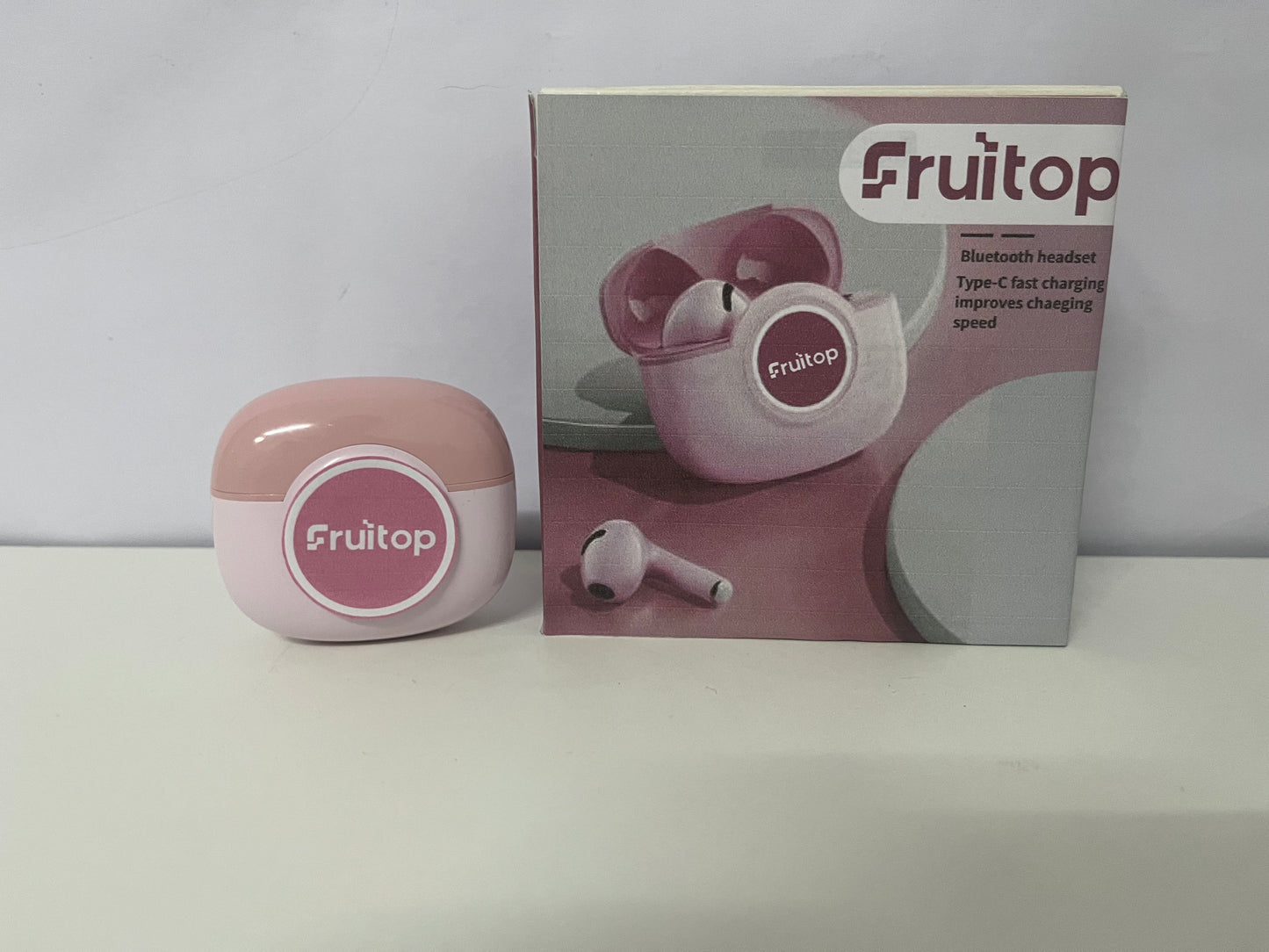Fruitop Soft Pink True Wireless Bluetooth Headphones A Stylish & Fast-Charging Audio-Visual Essential