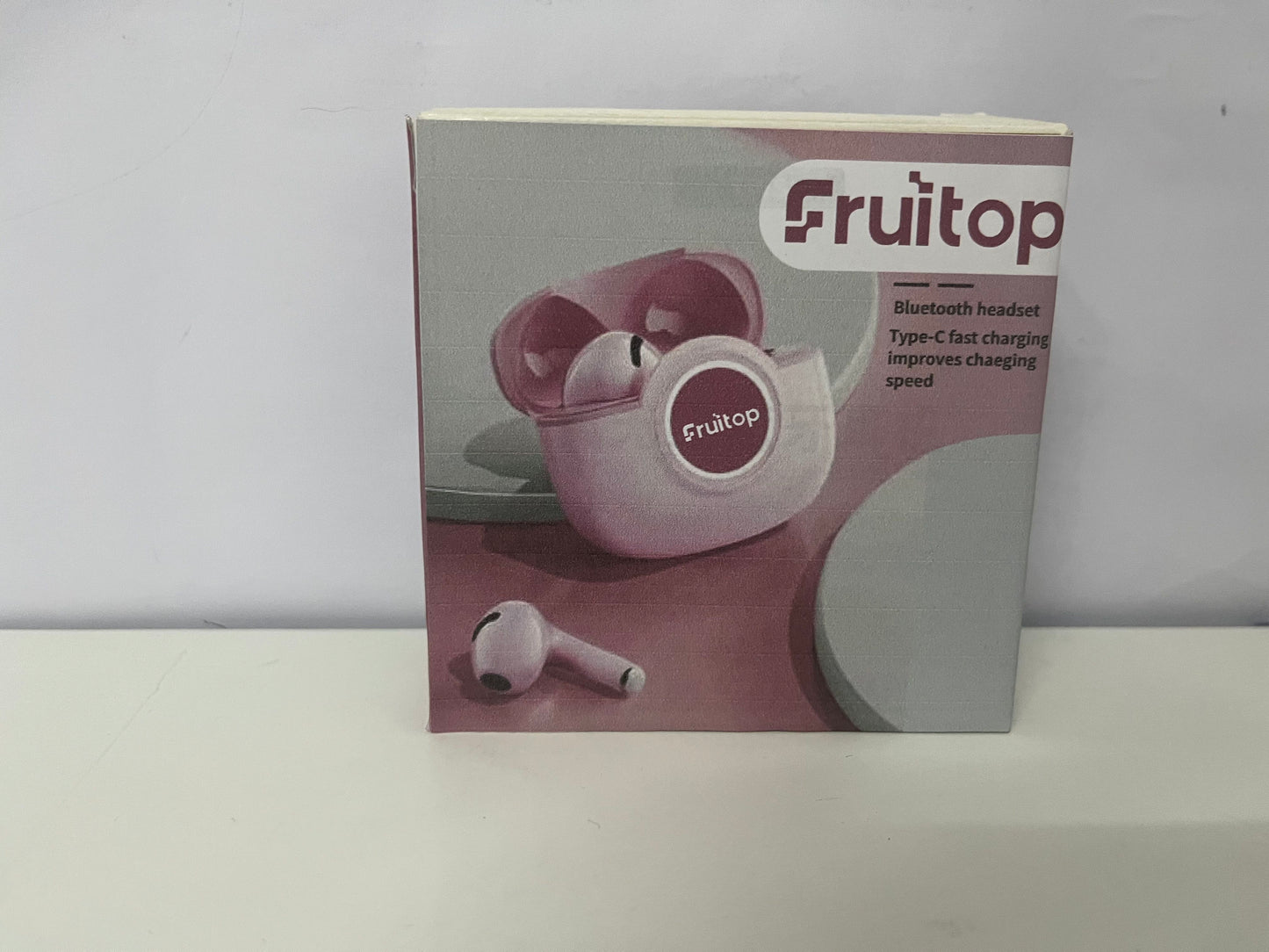 Fruitop Soft Pink True Wireless Bluetooth Headphones A Stylish & Fast-Charging Audio-Visual Essential
