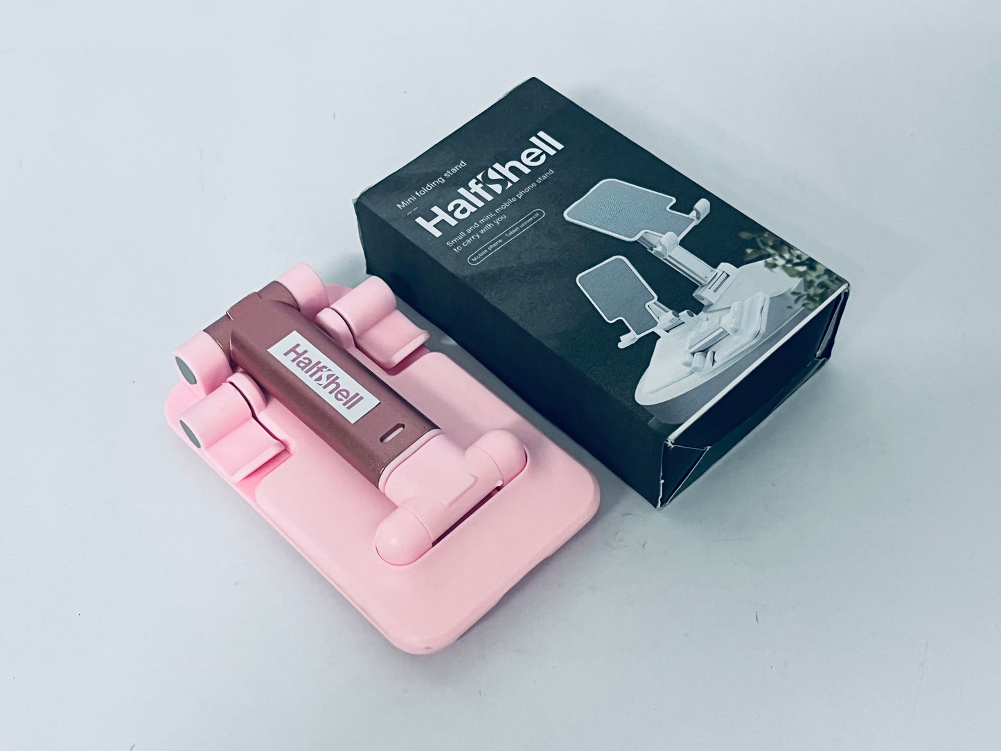 Halfshell Cell Phone Stand, Angle Height Adjustable Cell Phone Holder for Desk, Fully Foldable with Silicone Pad, Compatible with iPhone and All Mobile Phones Tablet, Sturdy Weighted Base (Pink)