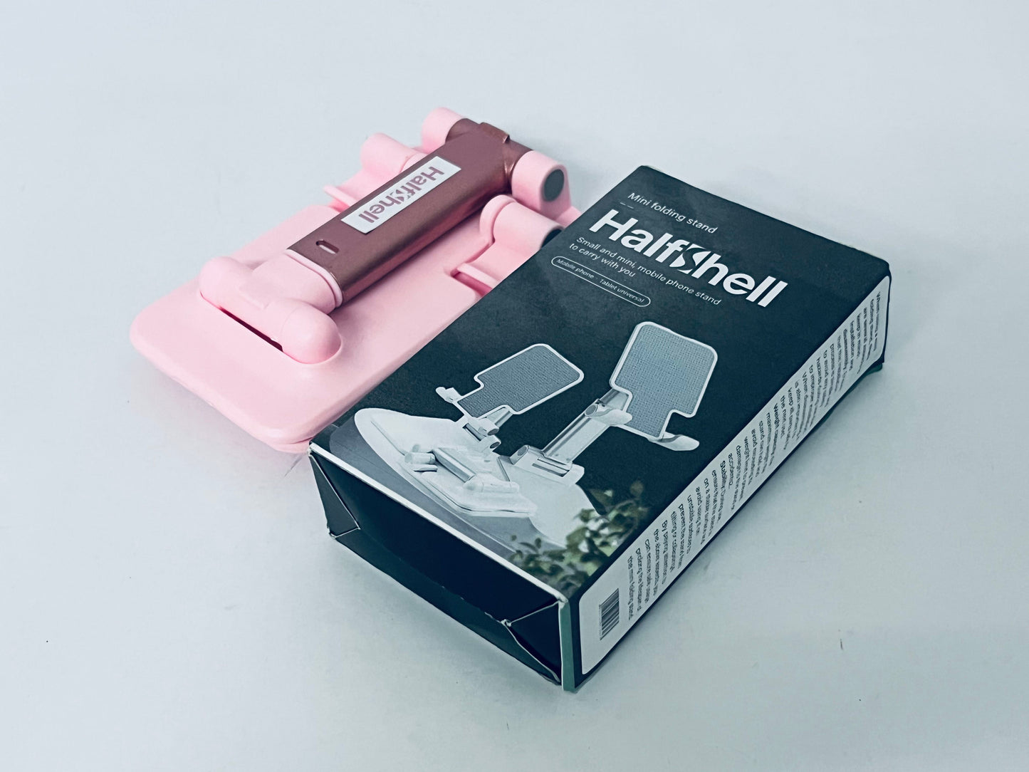 Halfshell Cell Phone Stand, Angle Height Adjustable Cell Phone Holder for Desk, Fully Foldable with Silicone Pad, Compatible with iPhone and All Mobile Phones Tablet, Sturdy Weighted Base (Pink)