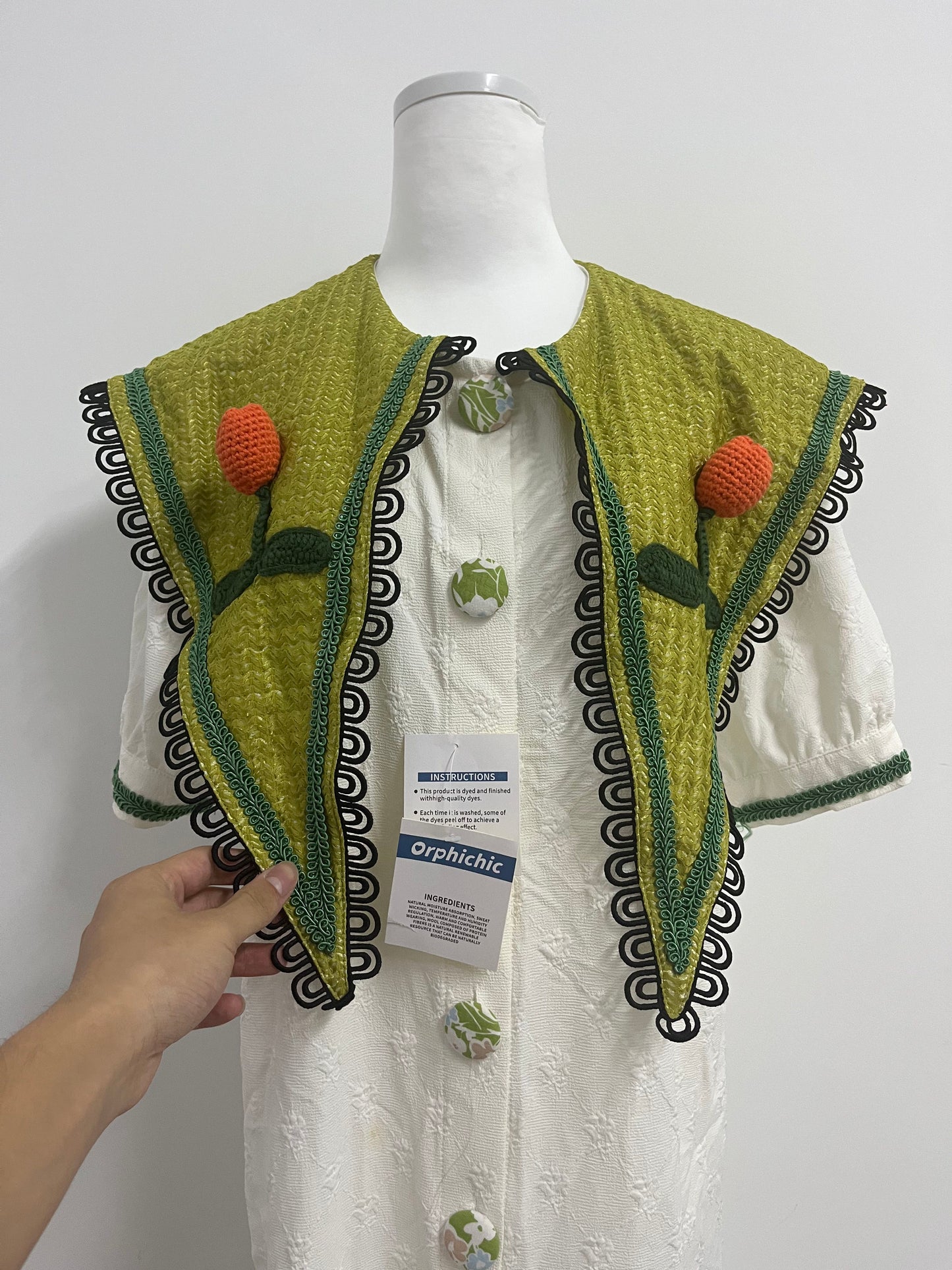 Orphichic Charming White Dress with Green Embellished Capelet