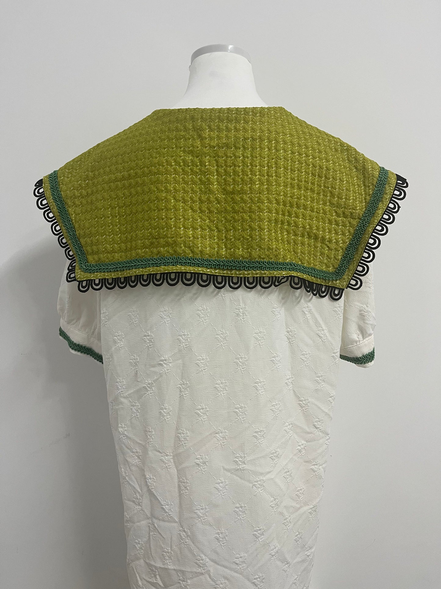 Orphichic Charming White Dress with Green Embellished Capelet