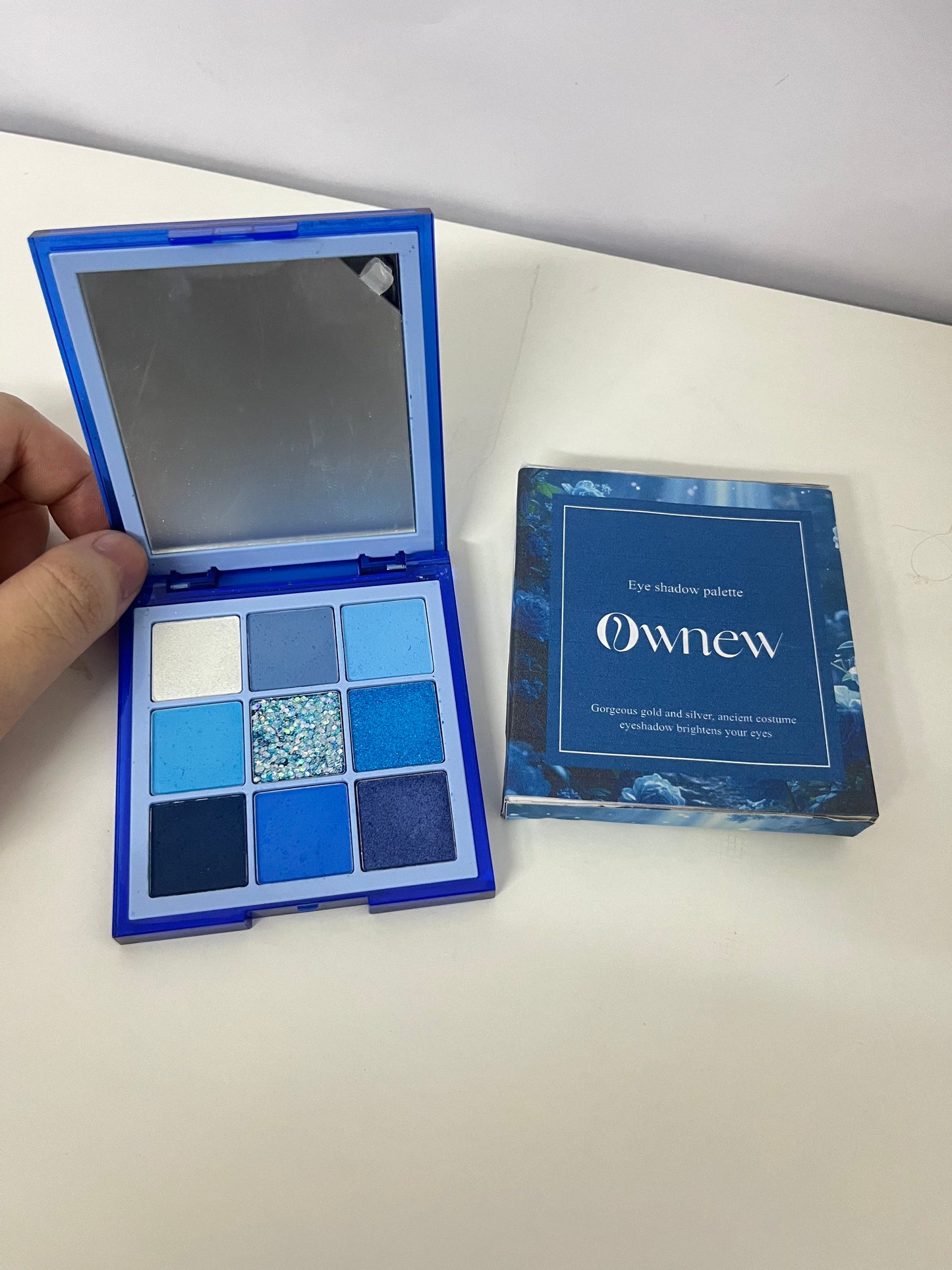 Ownew 9-Color Blue Eyeshadow Palette, Matte Shimmer Glitter Multi-Textures, Portable with Mirror, Long-Lasting Pigmented Eye Makeup Palette for Bold & Elegant Looks