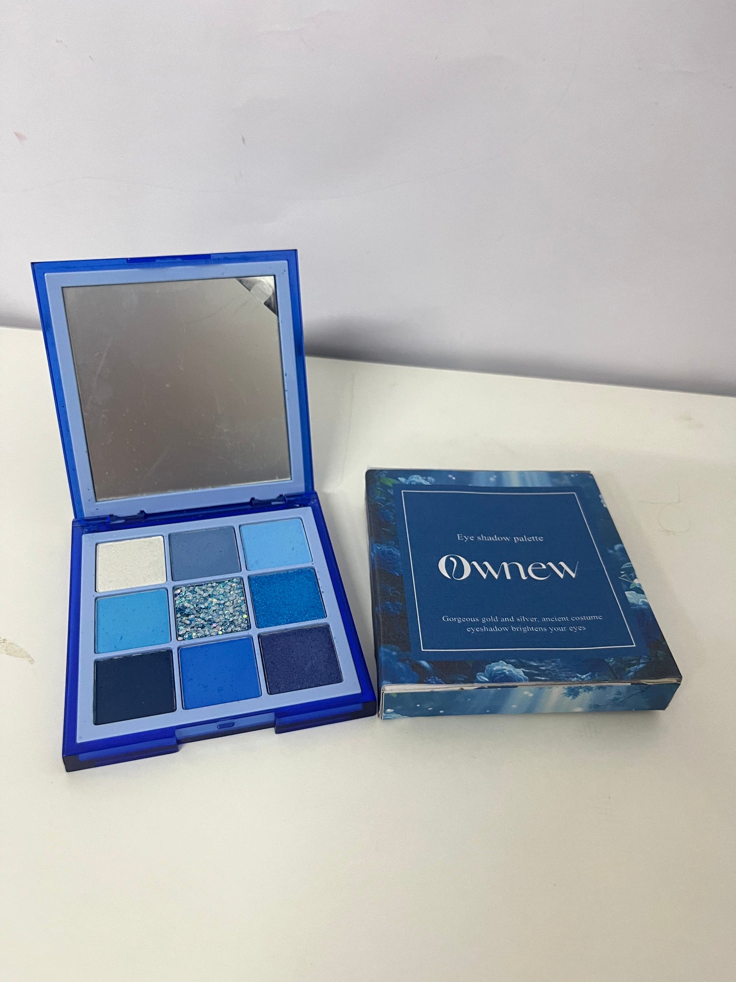 Ownew 9-Color Blue Eyeshadow Palette, Matte Shimmer Glitter Multi-Textures, Portable with Mirror, Long-Lasting Pigmented Eye Makeup Palette for Bold & Elegant Looks