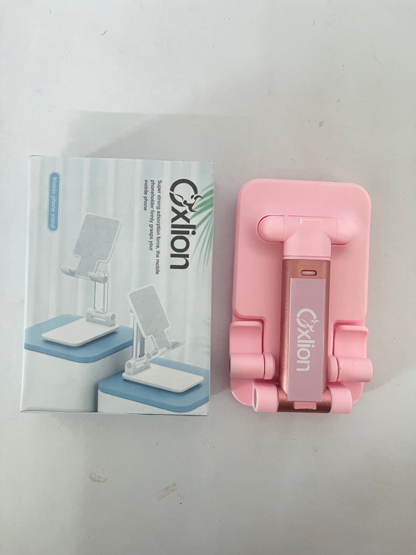 Oxlion Mounts for smartphones Cell Phone Stand, Adjustable Angle and Height Cell Phone Holder for Desk, Foldable and Portable, Anti-Slip Silicone Pad, Compatible with All Mobile Phones and 4-8 Inch Devices, Pink