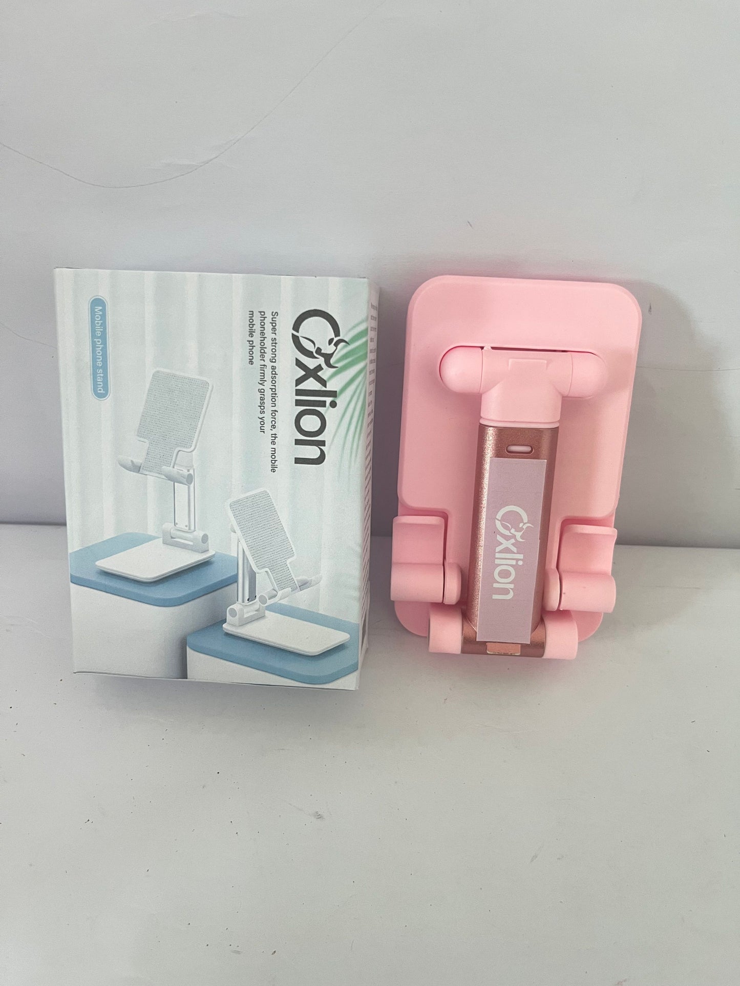 Oxlion Mounts for smartphones Cell Phone Stand, Adjustable Angle and Height Cell Phone Holder for Desk, Foldable and Portable, Anti-Slip Silicone Pad, Compatible with All Mobile Phones and 4-8 Inch Devices, Pink