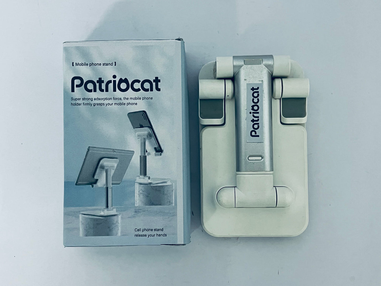 Patriocat Cell Phone Stand,Adjustable Angle Height Phone Honder for Desk,Fully Foldable Portable Phone Mount,Compatible with All Mobile Phones and Small Tablet.