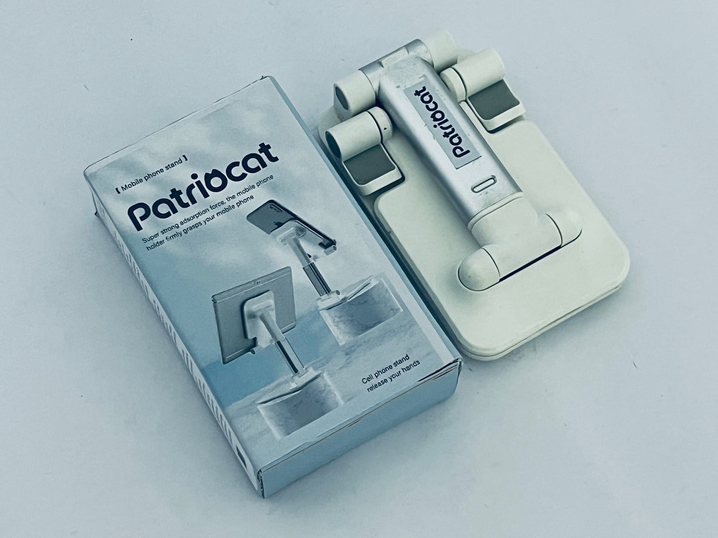 Patriocat Cell Phone Stand,Adjustable Angle Height Phone Honder for Desk,Fully Foldable Portable Phone Mount,Compatible with All Mobile Phones and Small Tablet.