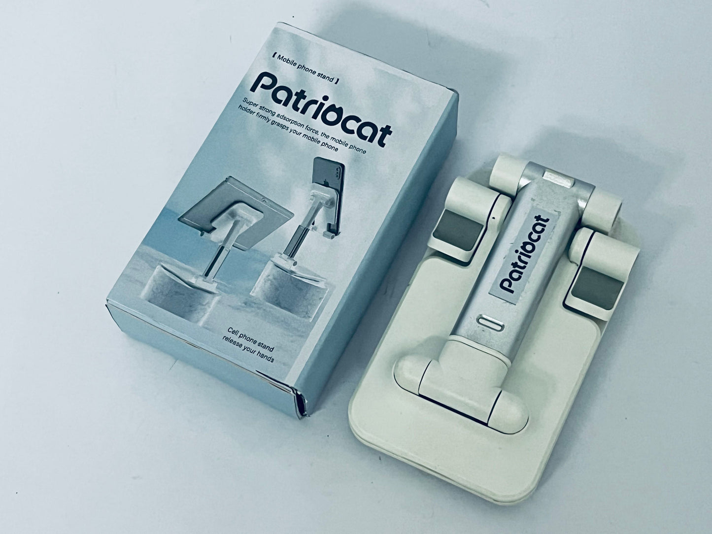 Patriocat Cell Phone Stand,Adjustable Angle Height Phone Honder for Desk,Fully Foldable Portable Phone Mount,Compatible with All Mobile Phones and Small Tablet.