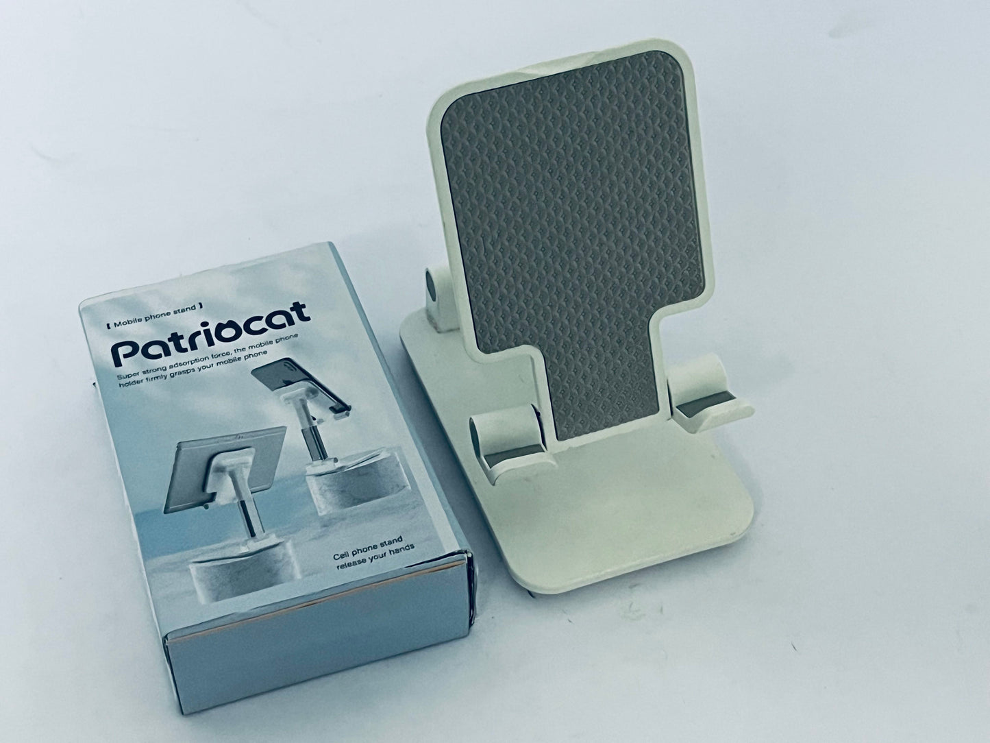 Patriocat Cell Phone Stand,Adjustable Angle Height Phone Honder for Desk,Fully Foldable Portable Phone Mount,Compatible with All Mobile Phones and Small Tablet.