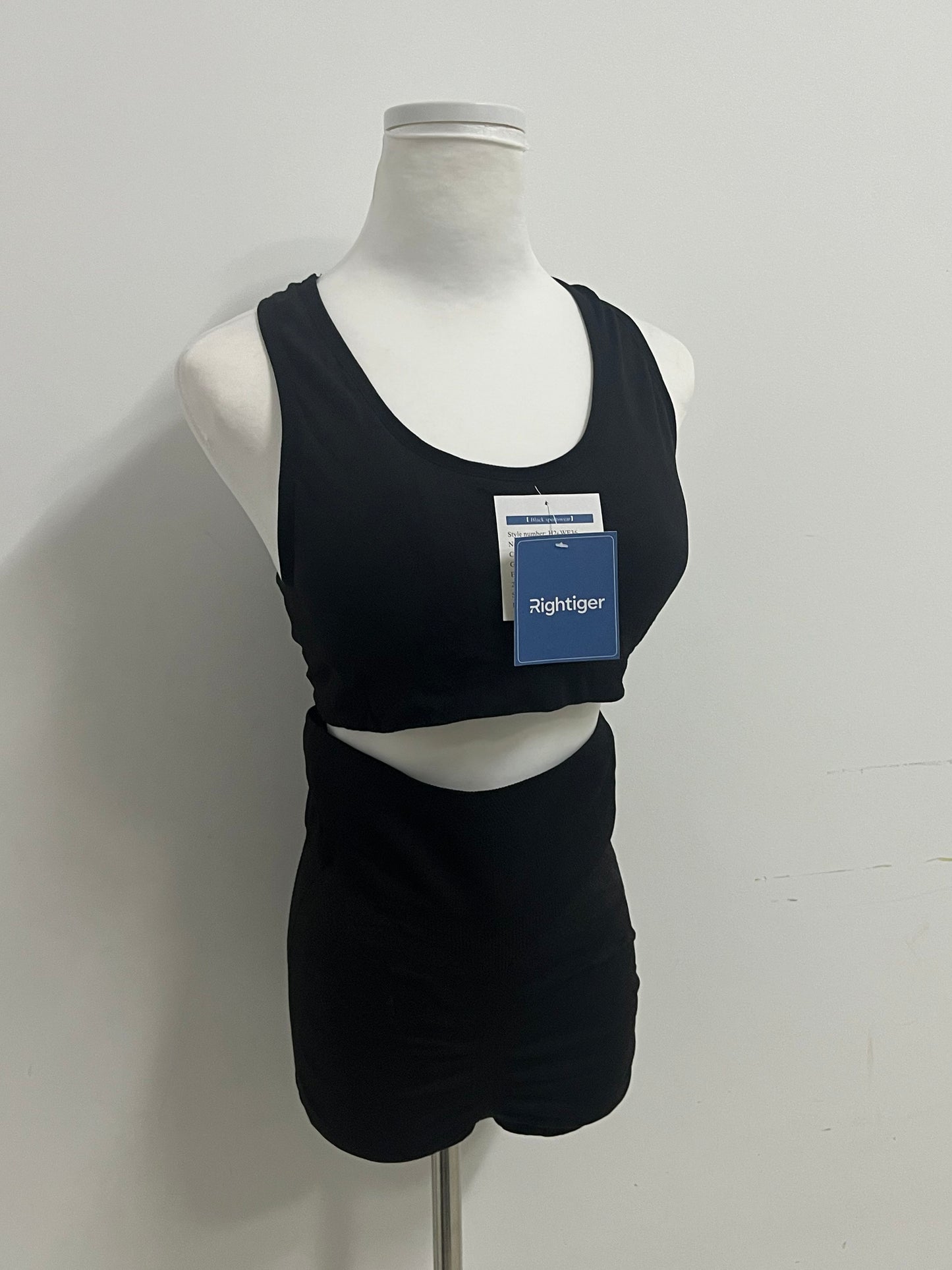 Rightiger Tracksuits: Black Slim-Fit Cut-Out Racerback Tank Top ✨