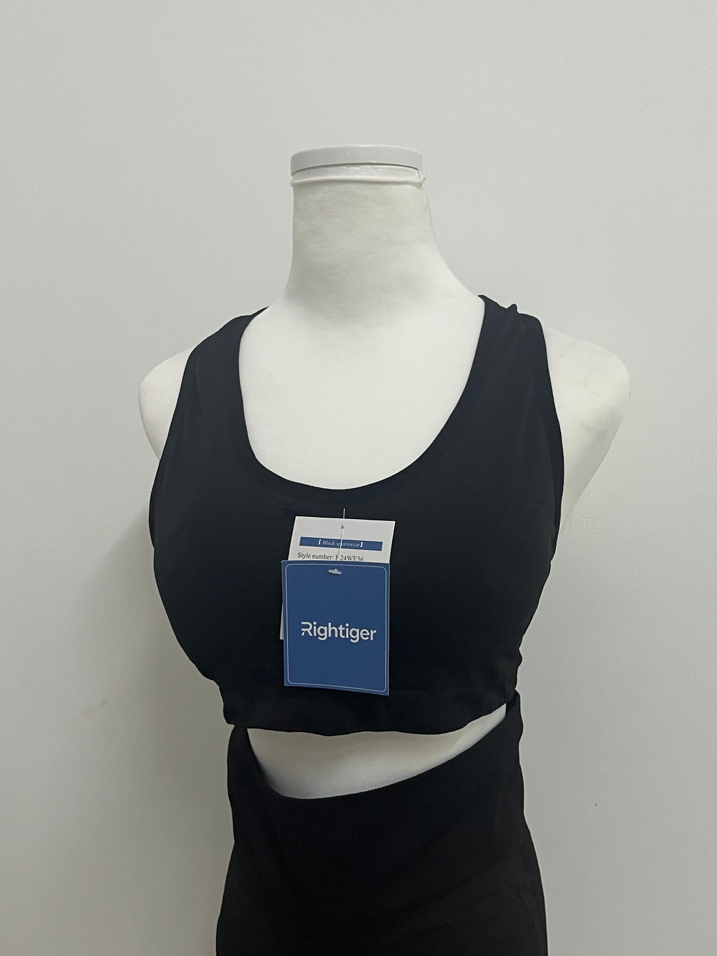 Rightiger Tracksuits: Black Slim-Fit Cut-Out Racerback Tank Top ✨