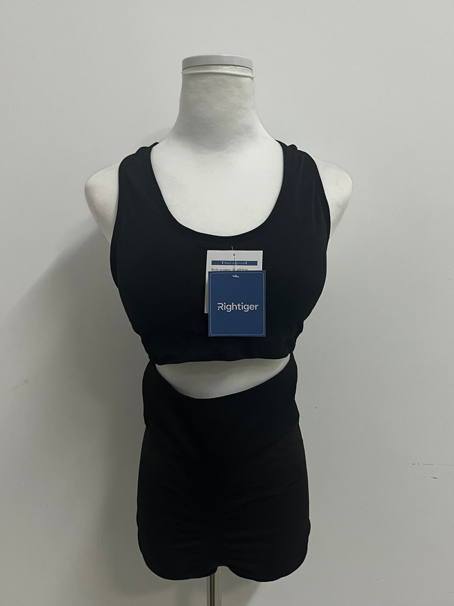 Rightiger Tracksuits: Black Slim-Fit Cut-Out Racerback Tank Top ✨