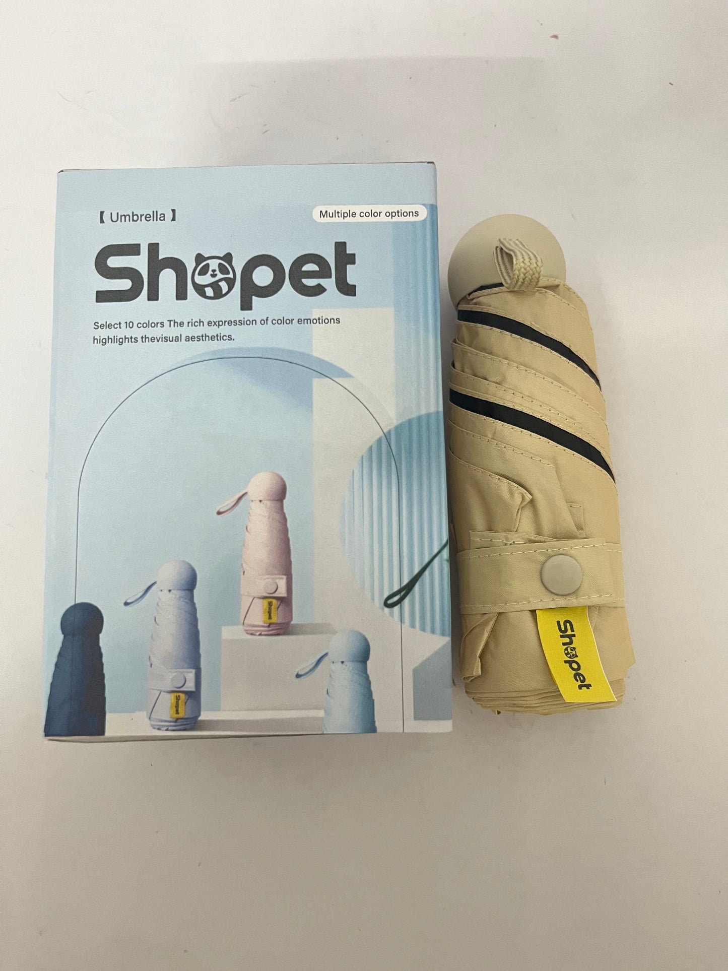 Shopet Umbrellas Travel Essentials Mini Umbrella Small Compact UV Sun Protection Lightweight Tiny Pocket Manual Open Close Umbrella for Women Kids and Men