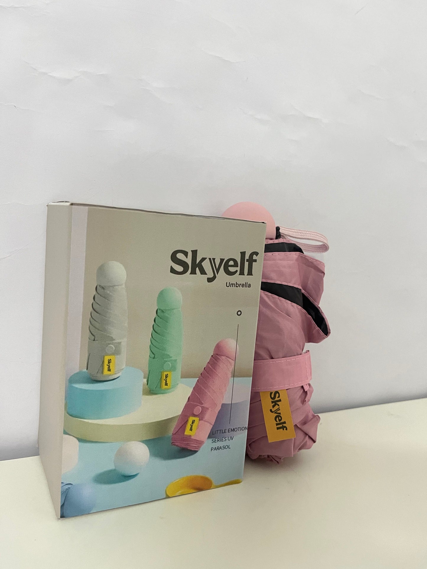 Skyelf Mini Capsule Umbrella - Ultra-Light Portable Umbrella for Sun and Rain