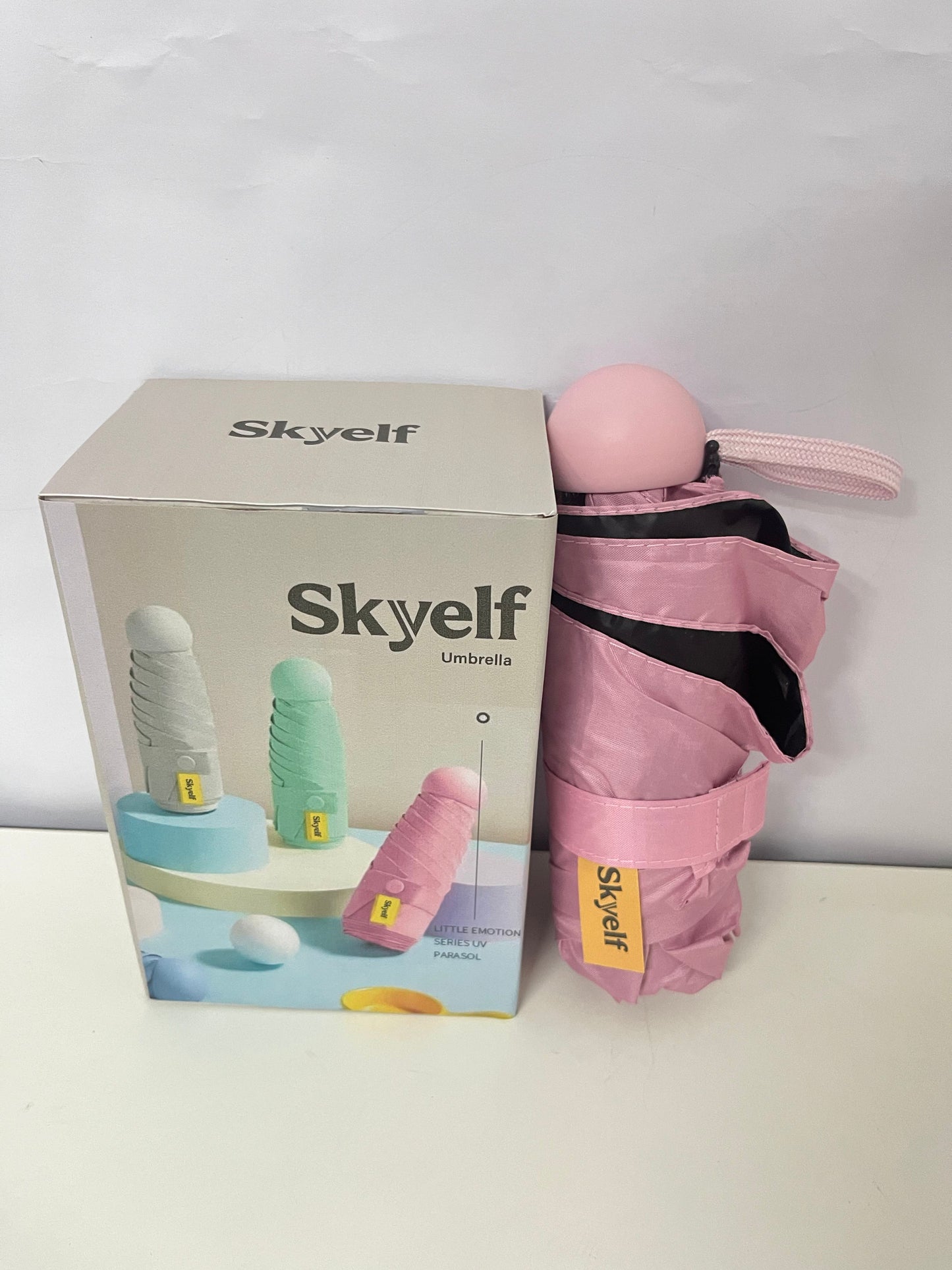 Skyelf Mini Capsule Umbrella - Ultra-Light Portable Umbrella for Sun and Rain