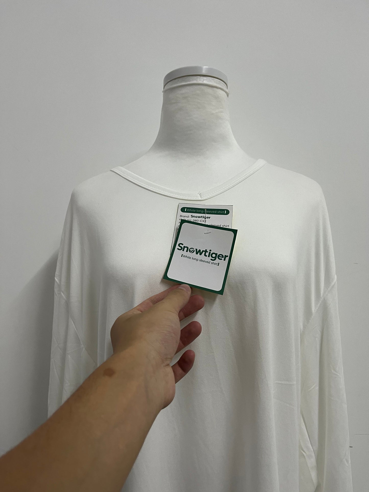 Snowtiger  Tops as clothing- White Oversized Long-Sleeve V-Neck Shirt