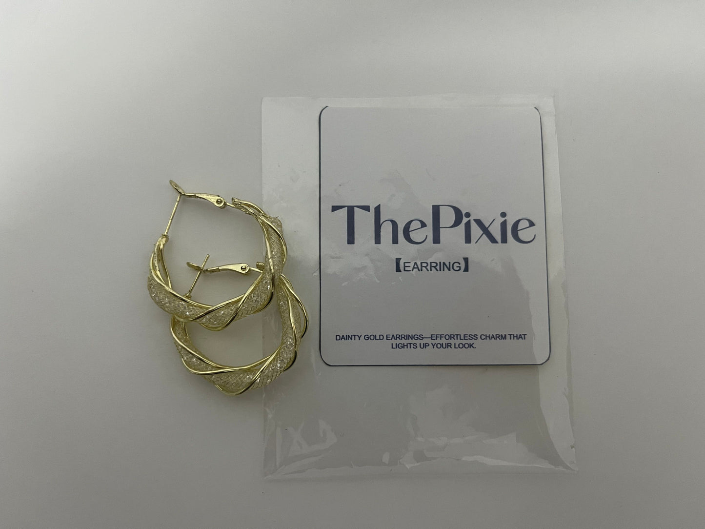 ThePixie Braided Gold Hoop Earrings An Elegant & Shiny Styling Essential