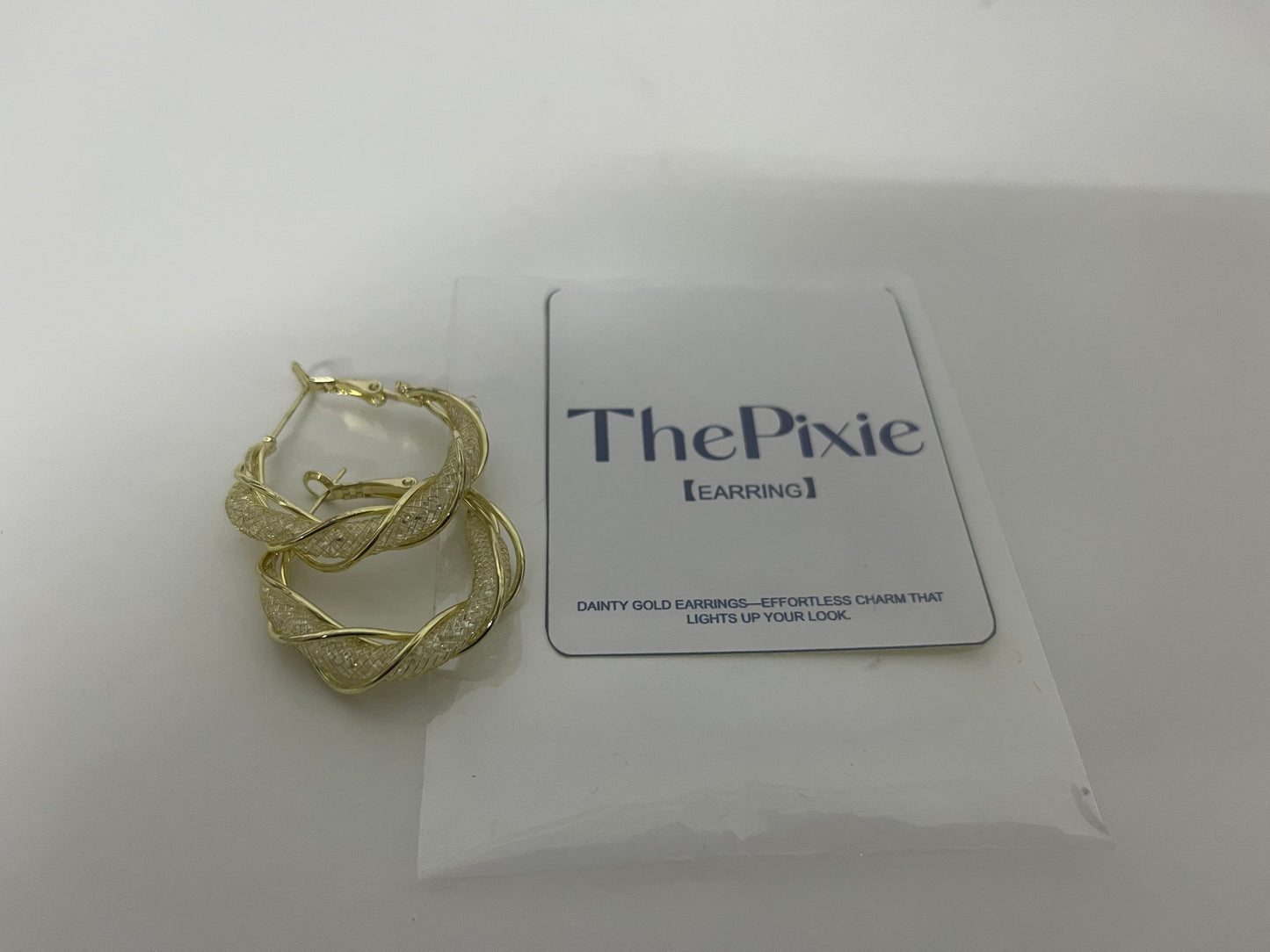 ThePixie Braided Gold Hoop Earrings An Elegant & Shiny Styling Essential