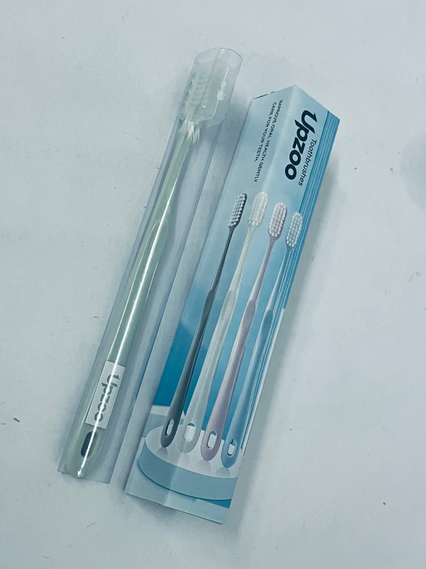 Upzoo Classic Manual Toothbrush with Extra Soft Activated-Charcoal, Tapered Bristles, Bioplastic Handle That Includes Travel Cap, Dentist-Approved, Great for Adults and Kids, Multi Color
