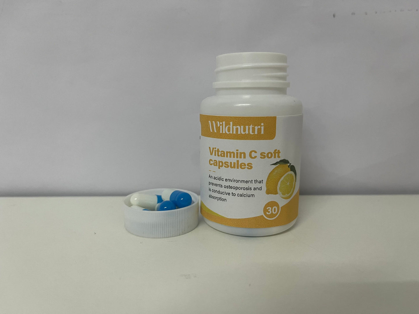 Wildnutri Lemon-Flavored Vitamin C Soft Capsules: Daily Supply for Dual Bone & Nutritional Care