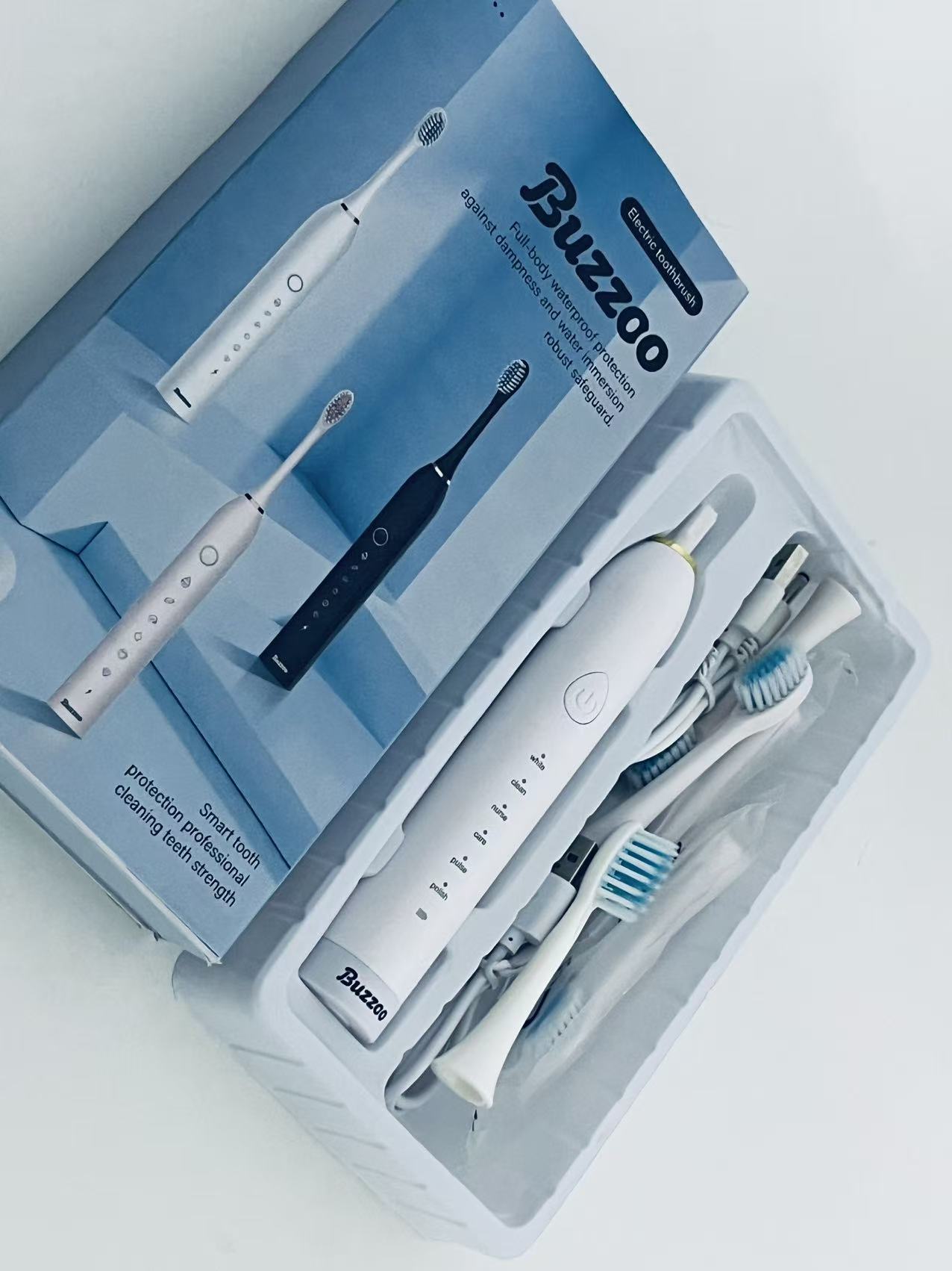 Buzzoo Full-Body Waterproof Sonic Electric Toothbrush - Multi-Mode Teeth Cleaning Set (with Replacement Heads)